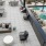 a pool with chairs and tables