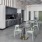 a kitchen with a table and chairs
